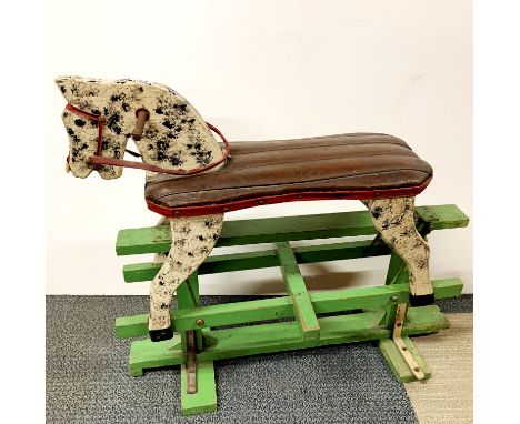 A 1950's child's rocking horse, L. 77cm.