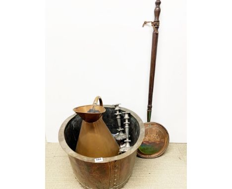 An antique hammered copper log bin with a copper jar, Dia. 53cm. Together with copper warming pan, two brass trivets and pair