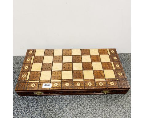 A wooden chess set and board, size 48 x 48cm.