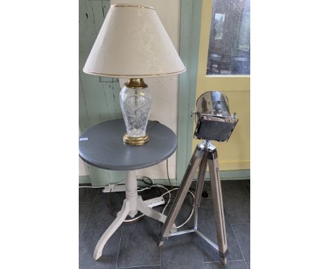 A brass and glass table lamp by Bayer Bavaria with ivory coloured shade and a free standing lamp in the form of a film light 