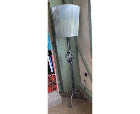 A grey painted metal standard lamp complete with shade 