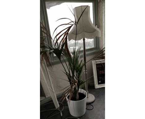 A light grey/stone painted wood standard lamp with shade together with a white ceramic planter and large indoor plant (2) 
