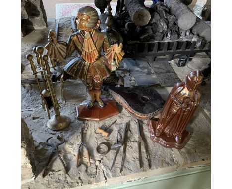 Pair of bellows, brass fire side companion set, a glazed fireside figure, one other in the form of a knight with fireside too