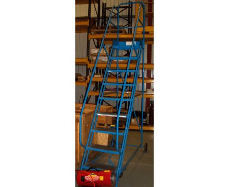 Blue metal 9 tread mobile warehouse ladder - please note this lot is to be collected from: Hyrax Solar Power Company Ltd, Uni