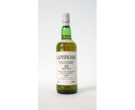 LAPHROAIG 15YO - PRE ROYAL WARRANT
A lovely bottle of the Pre-Royal Warrant Laphroaig 15 year old single malt scotch whisky. 