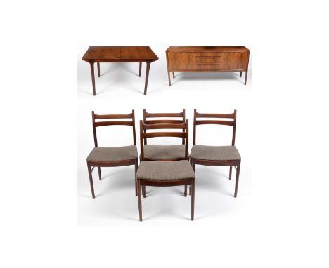 A.H. McIntosh & Co Ltd of Kirkcaldy: a rare model rosewood sideboard, matching extending dining table, and four dining chairs