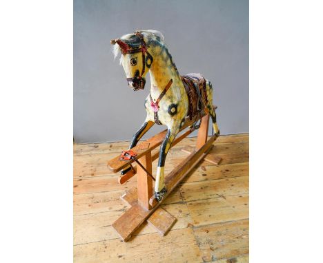 PAINTED DAPPLE EFFECT VINTAGE CHILD'S ROCKING HORSE (124cm long, 102cm high, 40cm wide) 