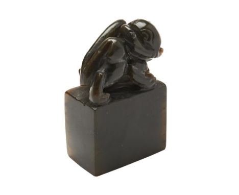 CARVED BLACK JADE 'LION' SEAL  LATE QING / EARLY REPUBLIC PERIOD the rectangular form seal carved with a lion 4cm high 