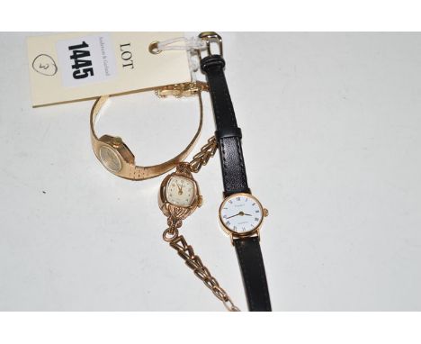 Three 9ct. gold watches, one by Accurist, another Rotary, the third Tissot, in a Tissot box.