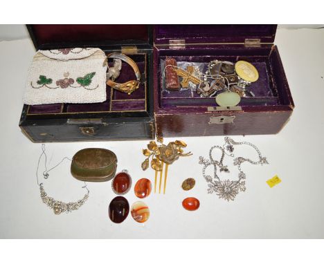 Two early 20th Century jewellery boxes, one containing costume jewellery, including: a gold and emerald set bangle (very dist