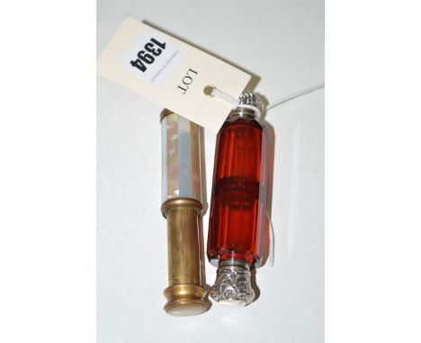 A ruby glass and silver double-end scent bottle; together with an atomiser by Marcel Franck, Le Kid, brass with faux mother-o