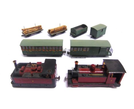 [OO-9 SCALE]. A MISCELLANEOUS COLLECTION  comprising two kit-built 0-6-0 tank locomotives, maroon livery; two coaches, green 