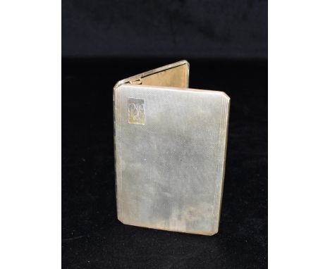 A VINTAGE SILVER CIGARETTE CASE The case of engine turned pattern with a monogrammed cartouche to the corner Hallmarked for B
