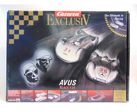 A 1/24 SCALE CARRERA EXCLUSIV AVUS SLOT CAR RACING SET  with a Mercedes-Benz W125 and Auto Union Typ C, boxed.