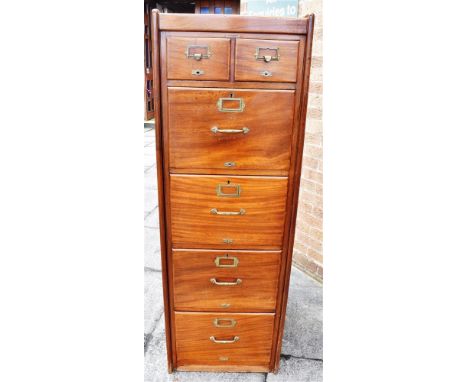 A MAHOGANY CASED FILING CABINET  fitted with two short and four long drawers, metal trade label for 'MANIFOLDIA WEST BROMWICH
