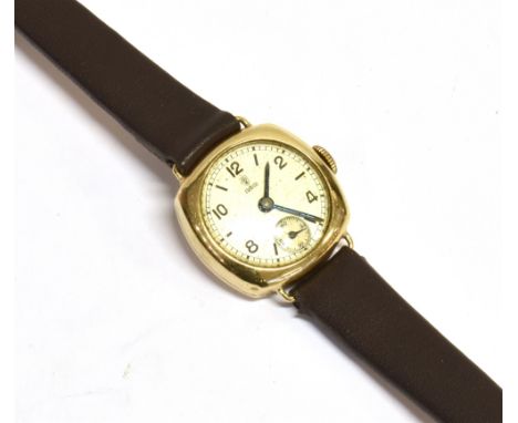 A VINTAGE TUDOR SMALL ROSE WRISTWATCH  the watch with signed cream dial, sub dial, and blue batons, the case in yellow metal 
