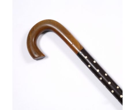 An Indian ebony and ivory walking stick 19th Century with horn handle, 88cm