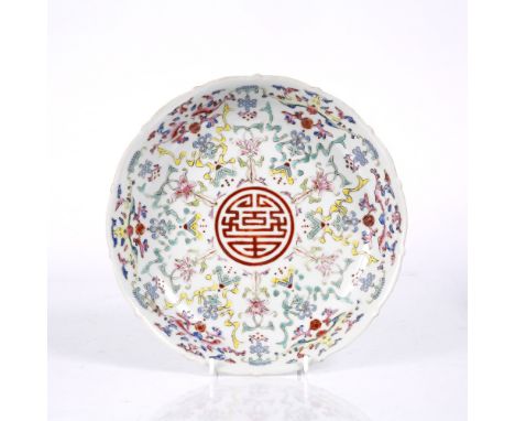 A Chinese famille rose porcelain saucer dish 19th Century decorated with a central Zhuanshu script, Shou character within lot