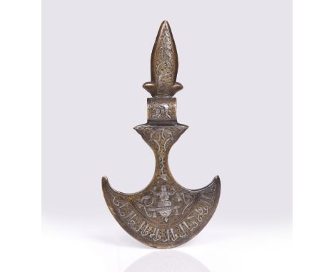 A Persian Qajar axe head (tabar) 19th Century with scrolling silver metal arabesques and animal and  figure inlay with text t