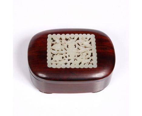 A Chinese hardwood oval box circa 1920 with inset jade rectangular plaque, 12cm