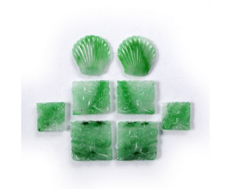 A collection of eight spinach jade mounts including two shell shaped