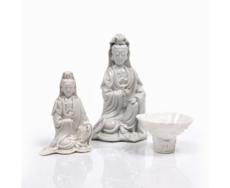 A Chinese Fukien blanc de chine seated figure of Guanyin 18th Century holding a scroll, 18cm, a Chinese Fukien blanc de chine