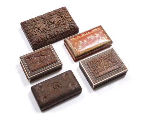 A Burmese carved rectangular box  with hunting scene 27cm, two Indian carved boxes, a Persian lacquer box and one other Burme