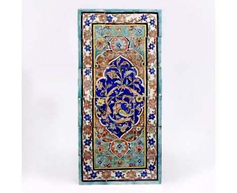 A Qajar polychrome tile panel 19th Century with central cobalt blue foliate panel with trailing flowers and leaves within a t