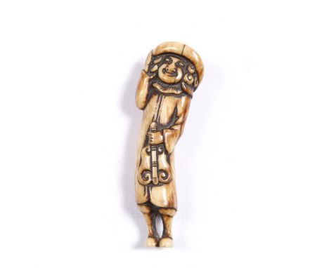 A Japanese bone netsuke of a standing curly haired Dutchman 18th Century holding an uchiwa style fan and holding his hat with