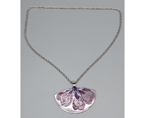 A Silver and Enamel pendant with a silver chain. Produced by Alistair Norman Grant. 