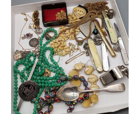 A Tray of collectable jewellery and odds to include Glasgow silver tea spoon, Bone Egyptian beetle revival bracelet, Enamel a