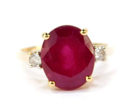 A  9ct gold Madagascan ruby and zircon ring, the oval cut ruby 6.35cts, size N/O, 2.24g gold, with certificate.