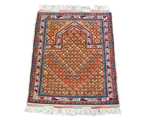 An Afghan prayer rug, the Mihab field filled with repeating floral motifs, against a light brown ground, within a border of s