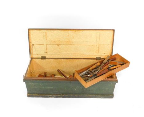 A Victorian painted pine tool chest, with hinged lid, and the contents to include a collection of nineteen moulding planes, l