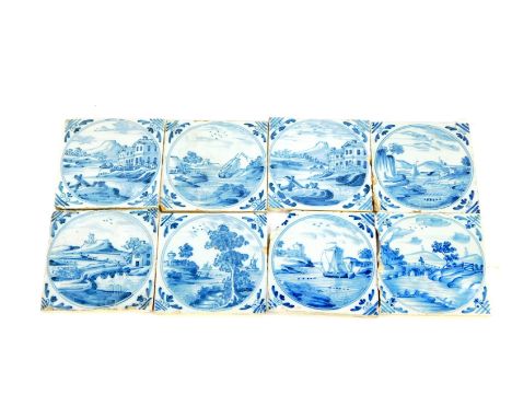 Eight 18thC Dutch delftware tiles, decorated with landscapes and riverscapes within circular reserves, 12.5cm.