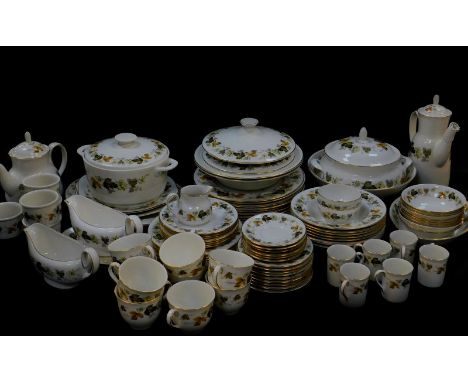 A Royal Worcester porcelain part dinner tea and coffee service, decorated in the Larchmont pattern, comprising casserole dish