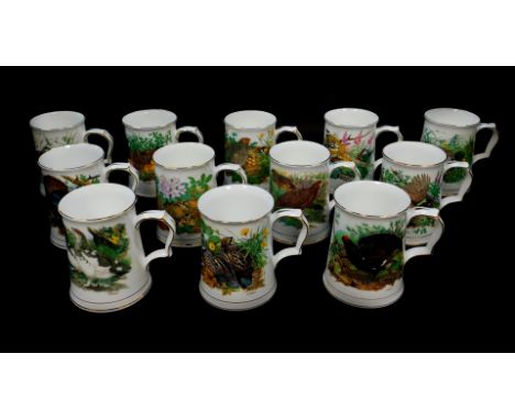 Twelve Hammersley porcelain The Game Bird tankards, by Maurice Pledger, for Danbury Mint, with leaflets and certificate.