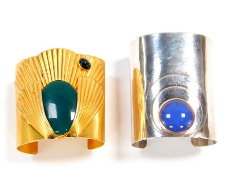 A Julia Booth silver and enamel modernist cuff, 88g, and a gilt and cabochon cuff. (2)