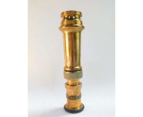 A vintage brass fireman's hose nozzle, serial no. 443, 32.5cm long.