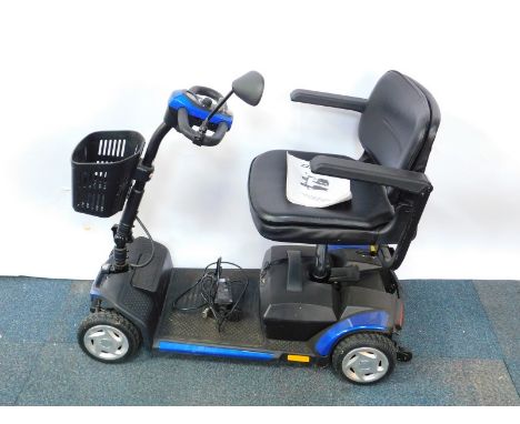 A QL Tech blue mobility scooter, model no QS0848, with battery and user manual.