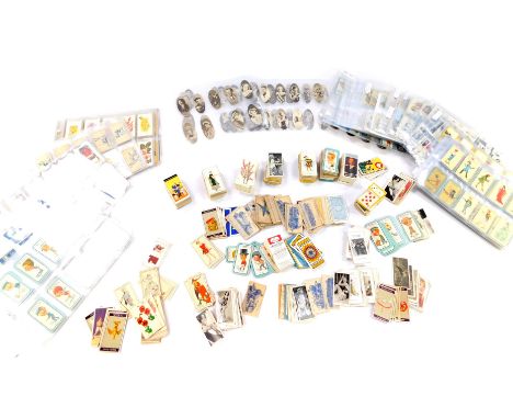 Carerra cigarette cards, part sets including The Nose Game, Tools, Alice In Wonderland, and Fortune Telling, together with fu