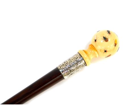 A rosewood walking stick, with an ivory ball knop, Shibayama  decorated with insects, signed, silver ferrule with foliate scr