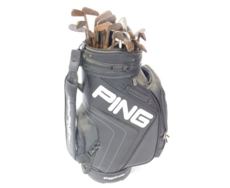 A Ping golf bag, containing a selection of vintage wooden shafted irons and putters, makers to include P McLeod, Lincoln. (26