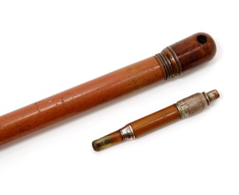 An early 20th century novelty system walking stick, the detachable pommel enclosing a pipe, the ferule marked Patent, malacca