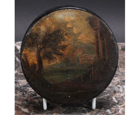 A late 18th century vernis martin and papier mache circular table snuff box, the puish-fitting cover painted with riuns in a 