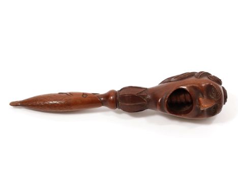 Nutcrackers - a treen screw-action novelty nut cracker, carved as the head of a gentleman, his mouth opened wide, the handle 