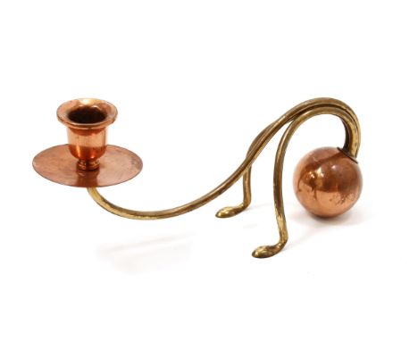 An Arts and Crafts brass and copper counter-balance candlestick, attributed to W A S Benson, campana sconce, the whiplash fra