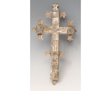 A 19th century Middle-Eastern mother of pearl Corpus Christi, carved and engraved with the crucified Christ, and the Virgin, 