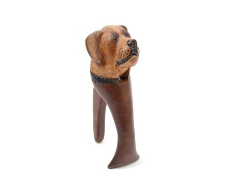 Nutcrackers - a Black Forest lever-action novelty nut cracker, carved and painted as the head of a St Bernard dog, 20cm long,
