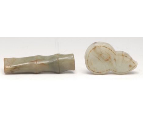A Chinese jade toggle, carved as a section of bamboo, 8.5cm long; another (2) 